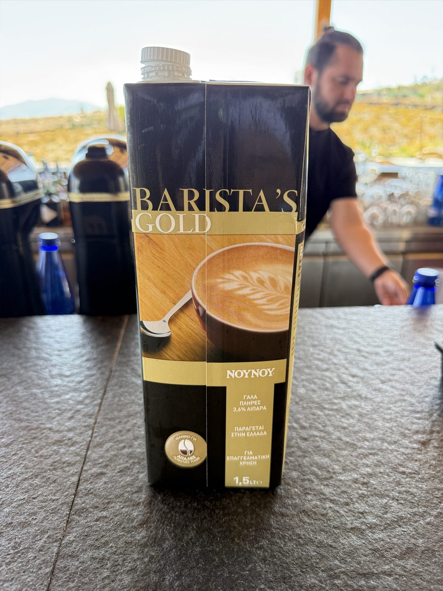 Carton of Barista's Gold whole milk by NOYNOY used for lattes at Magma Resort, Santorini
