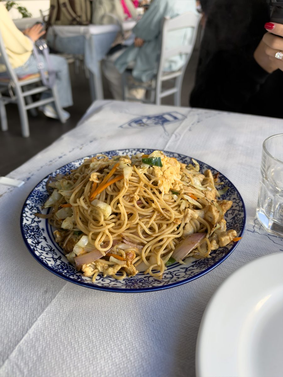 Stir-fried noodles with chicken, egg and vegetables at China Famous Foods in Fira, Santorini
