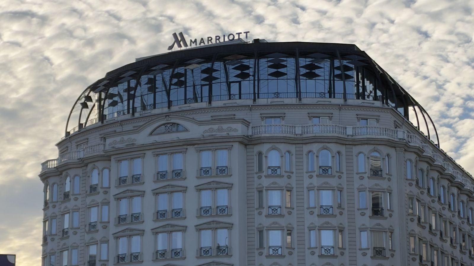 The Skopje Marriott Hotel on Macedonia Square with its glass rooftop and Marriott sign